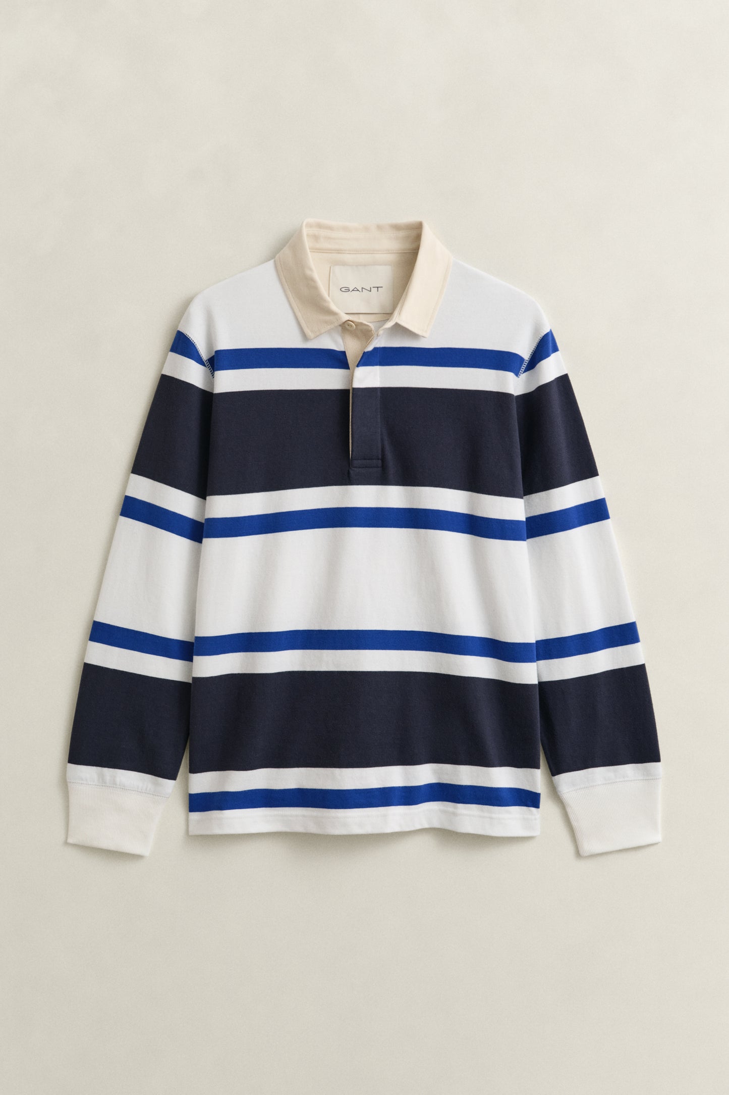 EVENING BLUE, BLOCKED STRIPE RUGGER, FLAT-LAY BY GANT AU.