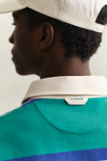 MODEL WEARING BLOCKED STRIPE RUGGER