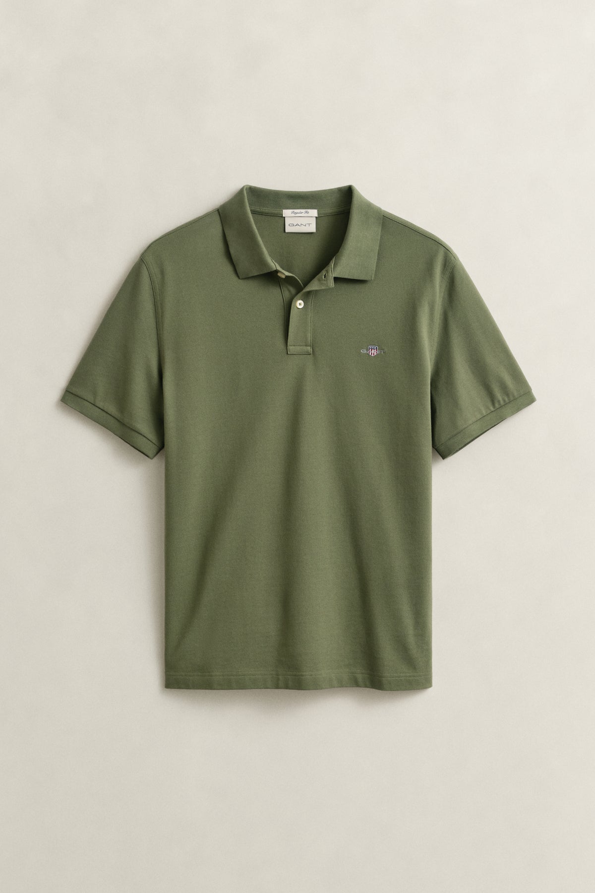 DRY HERB GREEN, REG SHIELD SS PIQUE POLO, FLAT-LAY BY GANT AU.