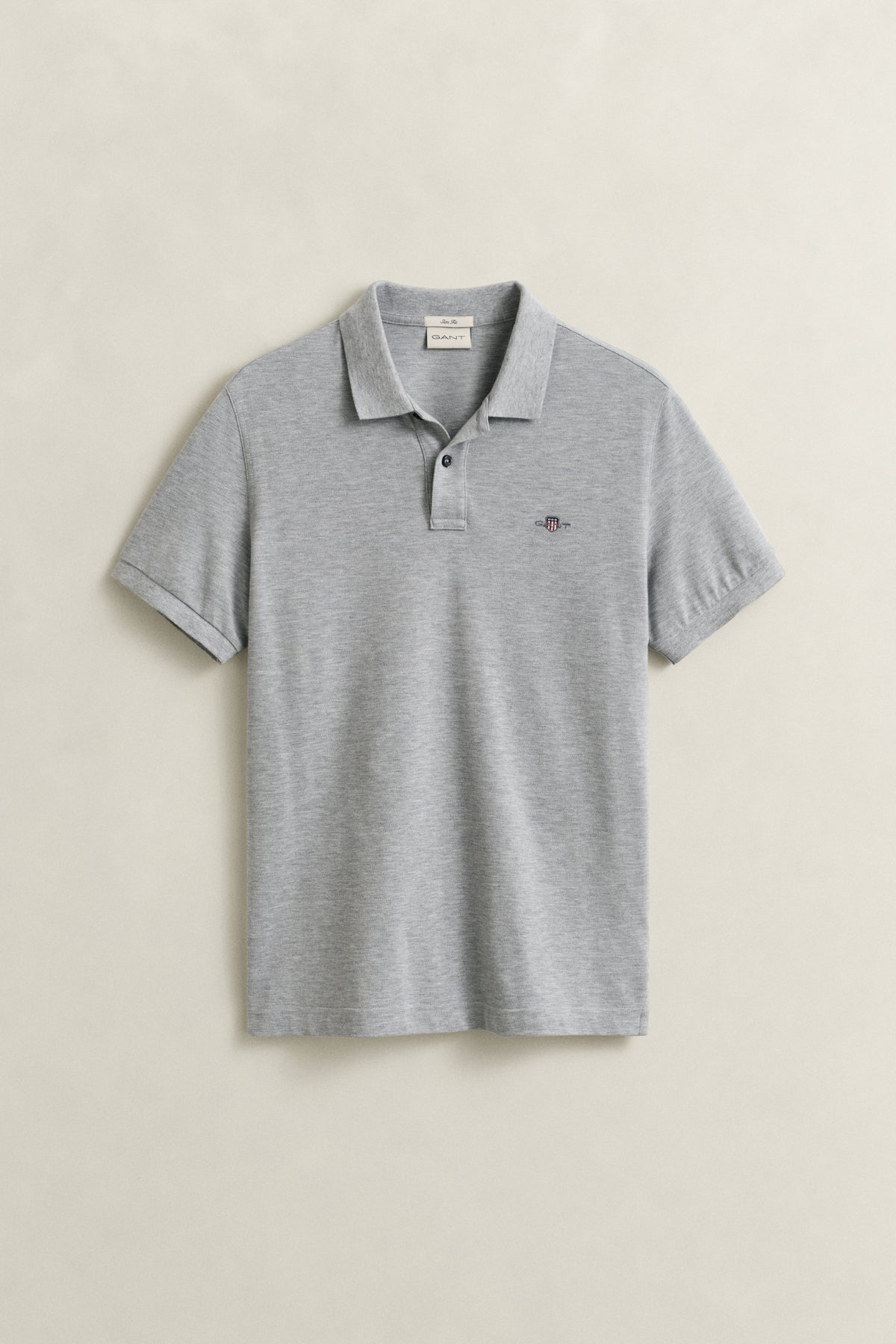 GREY MELANGE, SLIM SHIELD SS PIQUE POLO, FLAT-LAY BY GANT AU.