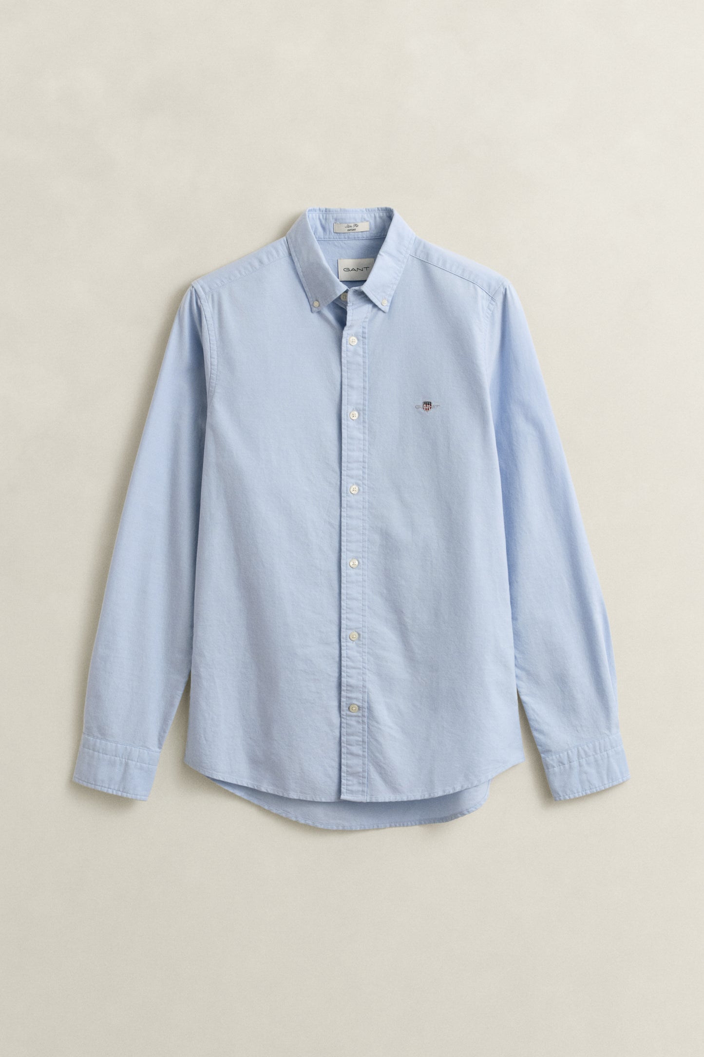 LIGHT BLUE, SLIM CLASSIC OXFORD SHIRT, FLAT-LAY BY GANT AU.