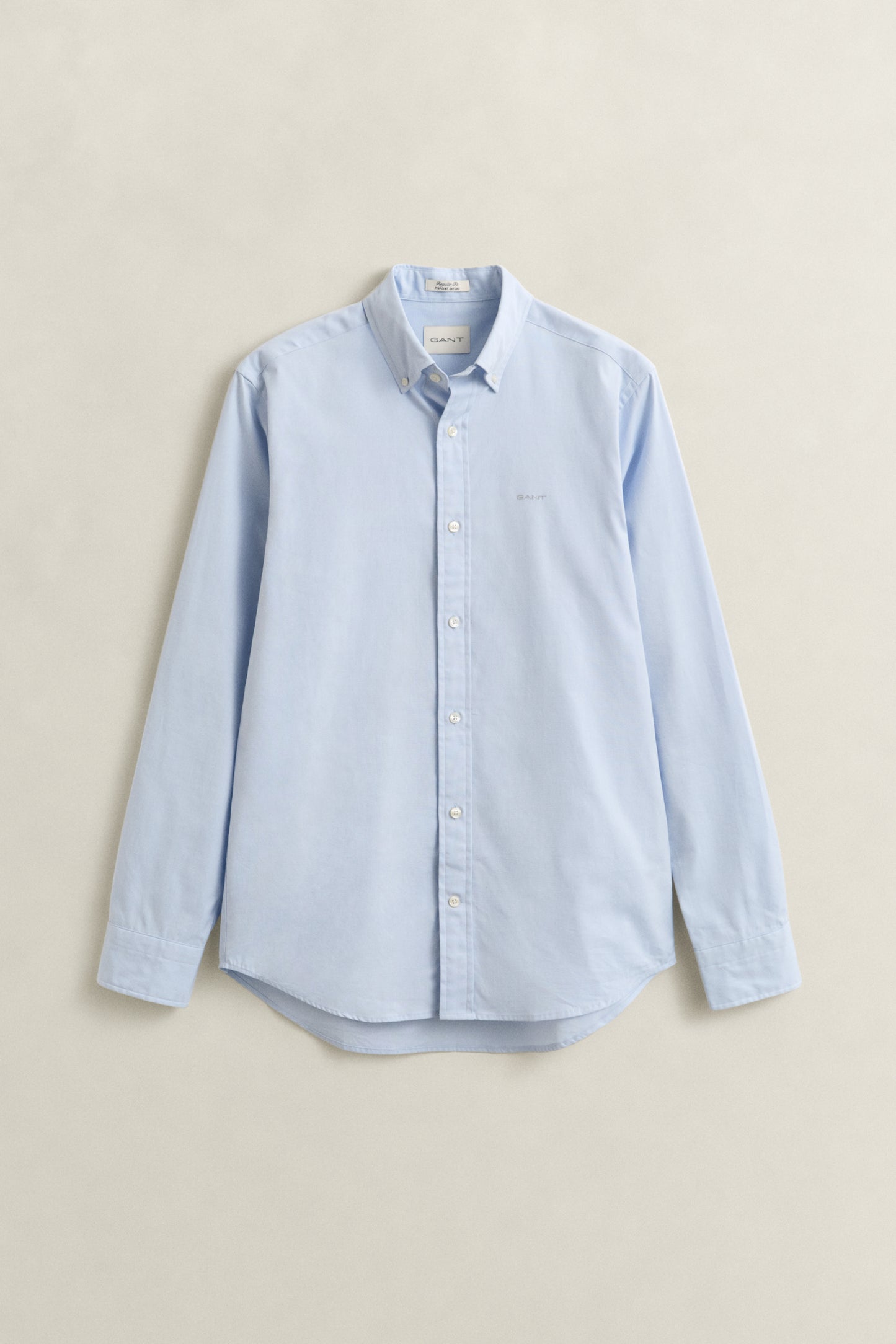 LIGHT BLUE, REG PINPOINT OXFORD SHIRT, FLAT-LAY BY GANT AU.