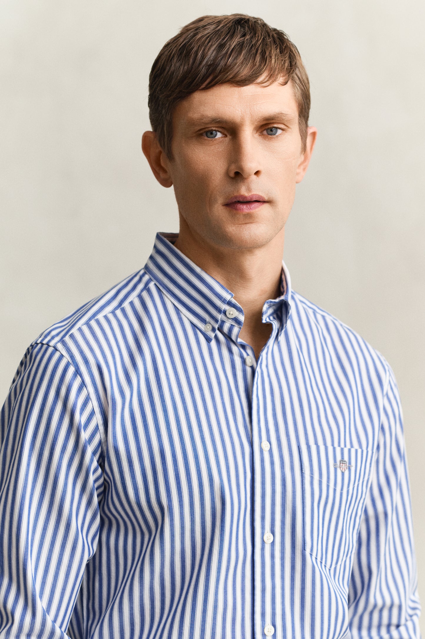 MODEL WEARING REG CLASSIC POPLIN STRIPE SHIRT