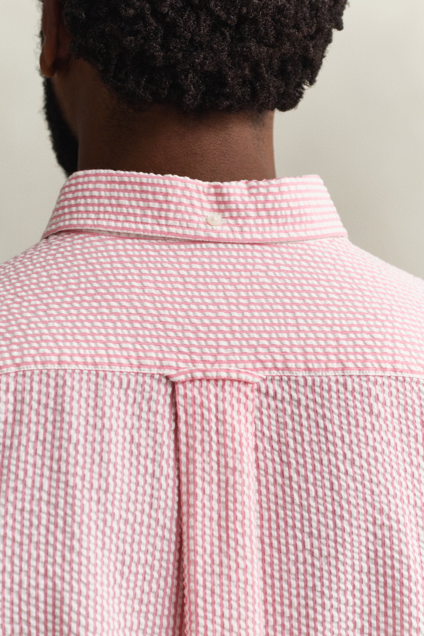 MODEL WEARING REG SEERSUCKER STRIPE SHIRT