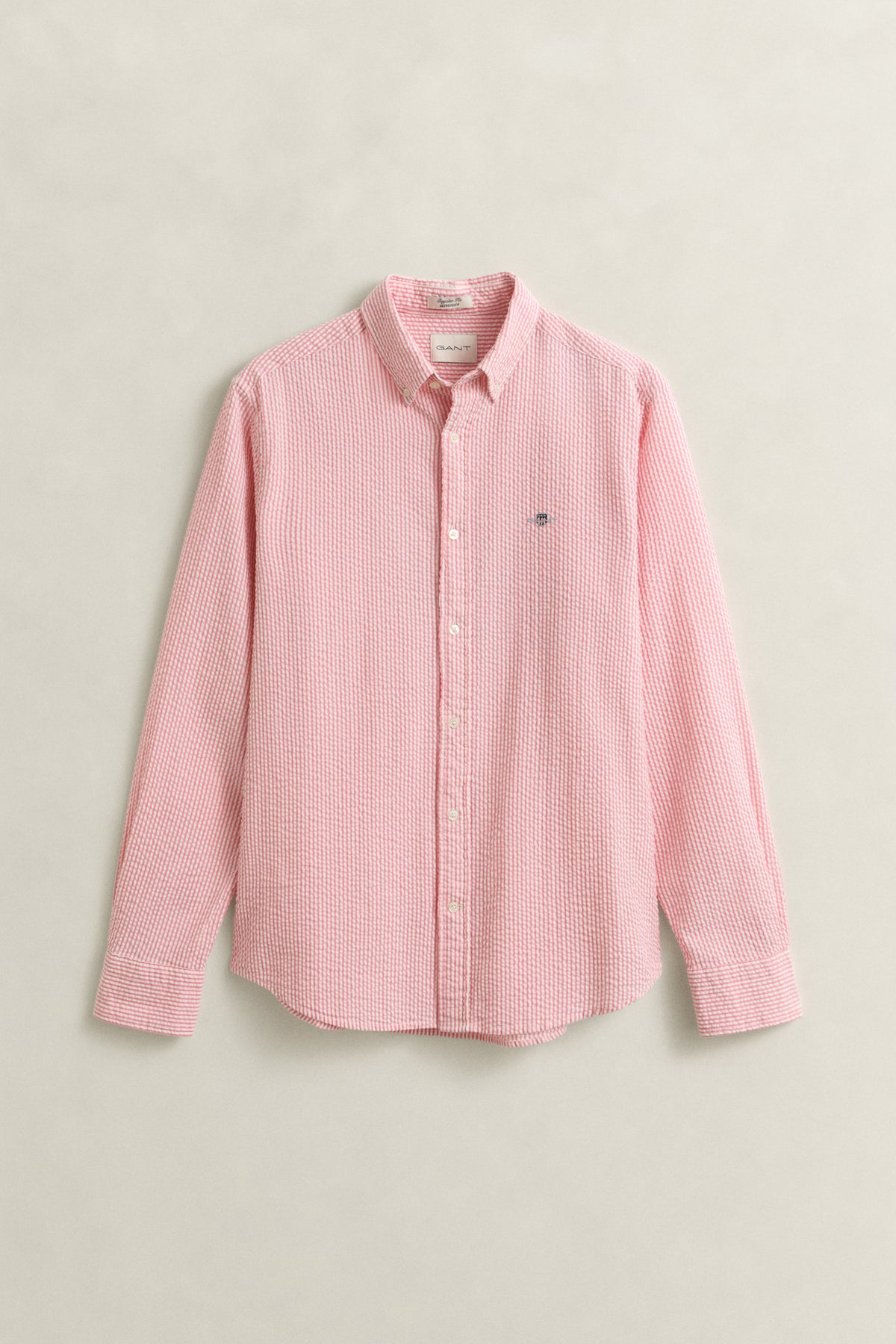ROSE PINK, REG SEERSUCKER STRIPE SHIRT, FLAT-LAY BY GANT AU.