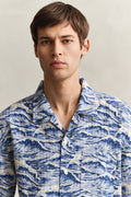 MODEL WEARING REL AOP CAMP COLLAR SS SHIRT