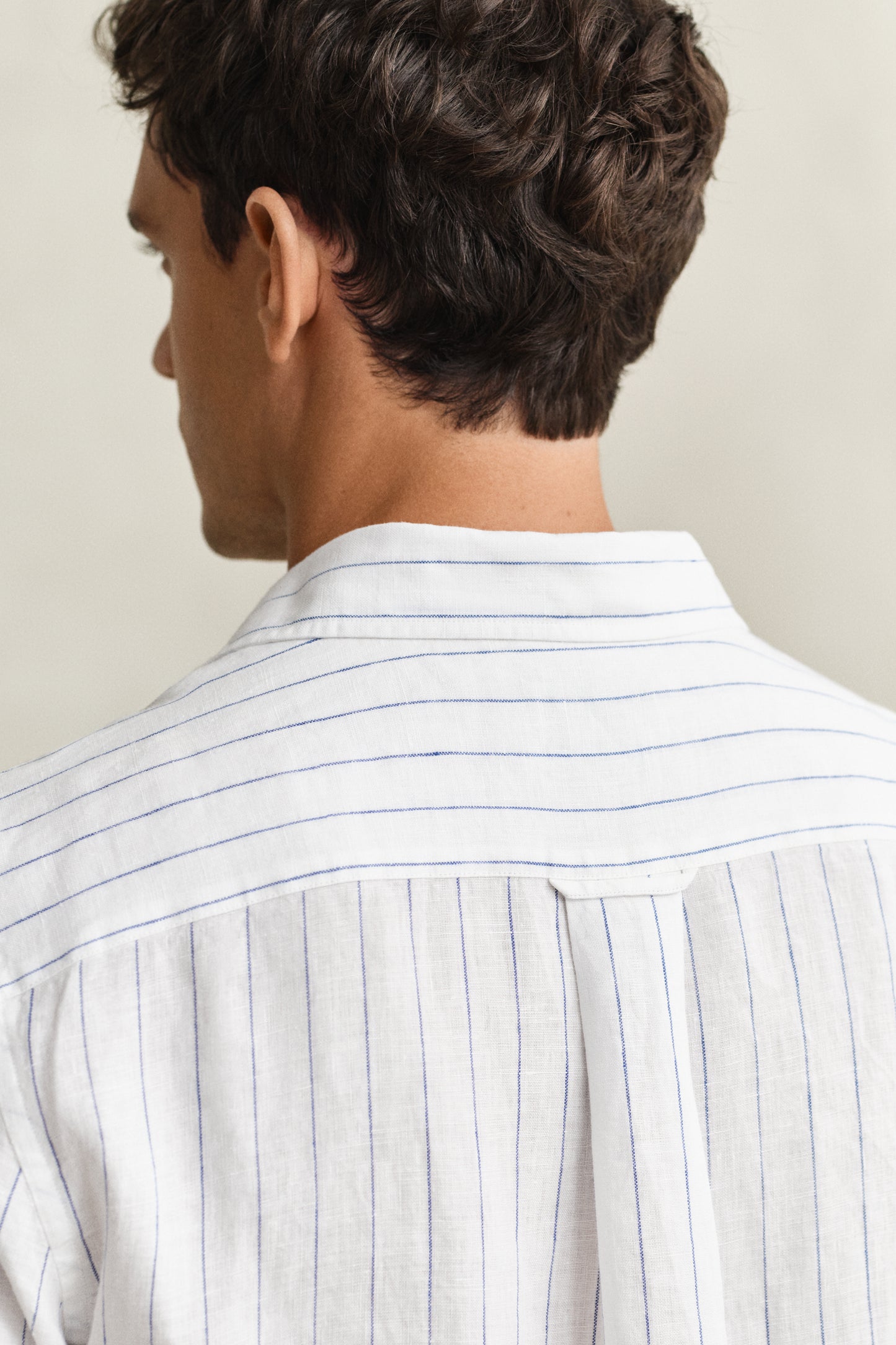 MODEL WEARING REG LINEN STRIPE SHIRT