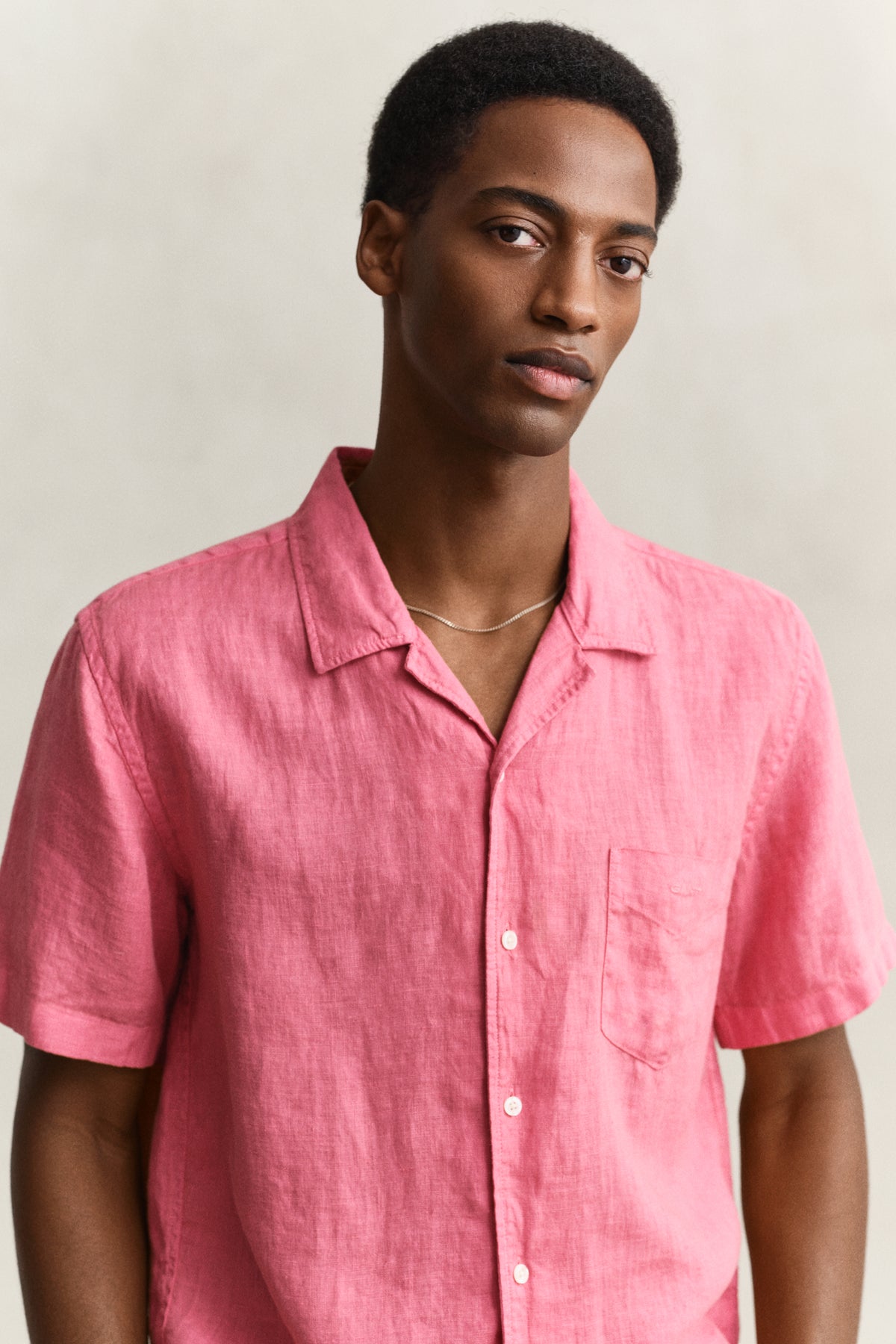 MODEL WEARING REG GMNT DYED LINEN SS CAMP SHIRT