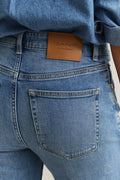 MODEL WEARING Slim Flared Jeans
