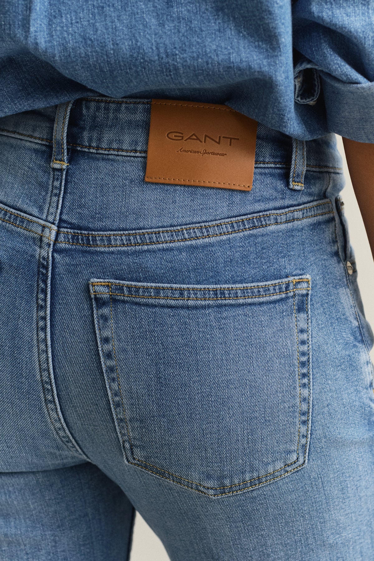 MODEL WEARING Slim Flared Jeans