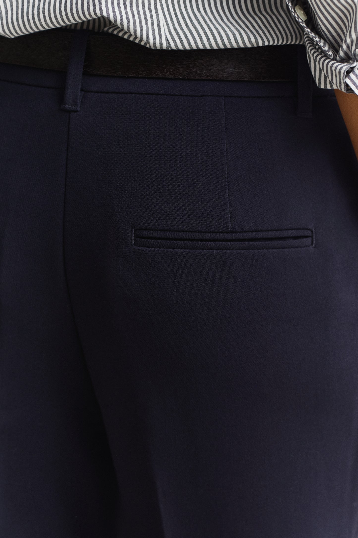 MODEL WEARING Slim Flared Slacks