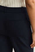 MODEL WEARING SLIM FLARE NAUTICAL PANTS