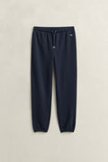 EVENING BLUE, REG SHIELD SWEATPANTS, FLAT-LAY BY GANT AU.