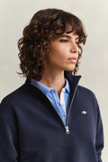 EVENING BLUE, SHIELD HALF-ZIP, CLOSE-UP BY GANT AU.