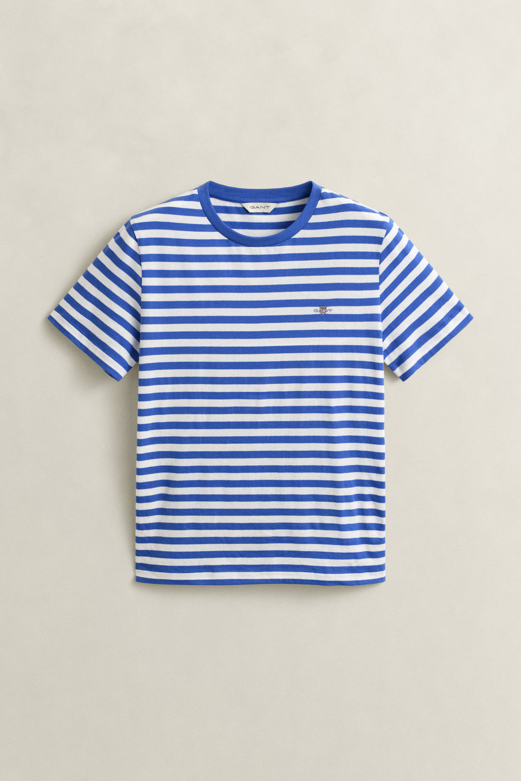 ROYAL BLUE, REG STRIPED SHIELD SS T-SHIRT, FLAT-LAY BY GANT AU.