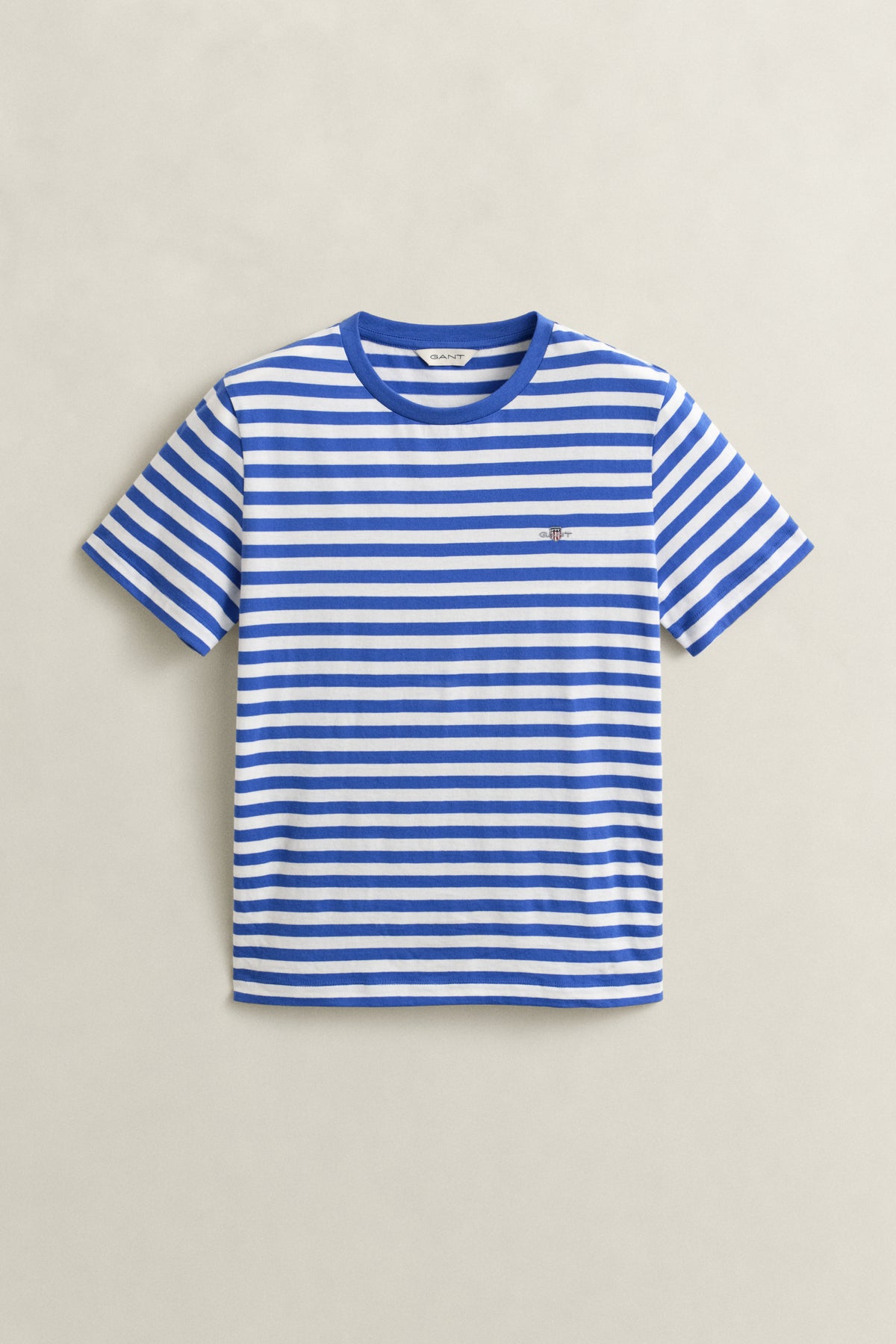 ROYAL BLUE, REG STRIPED SHIELD SS T-SHIRT, FLAT-LAY BY GANT AU.