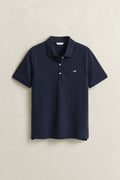 EVENING BLUE, REG SHIELD SS PIQUE POLO, FLAT-LAY BY GANT AU.