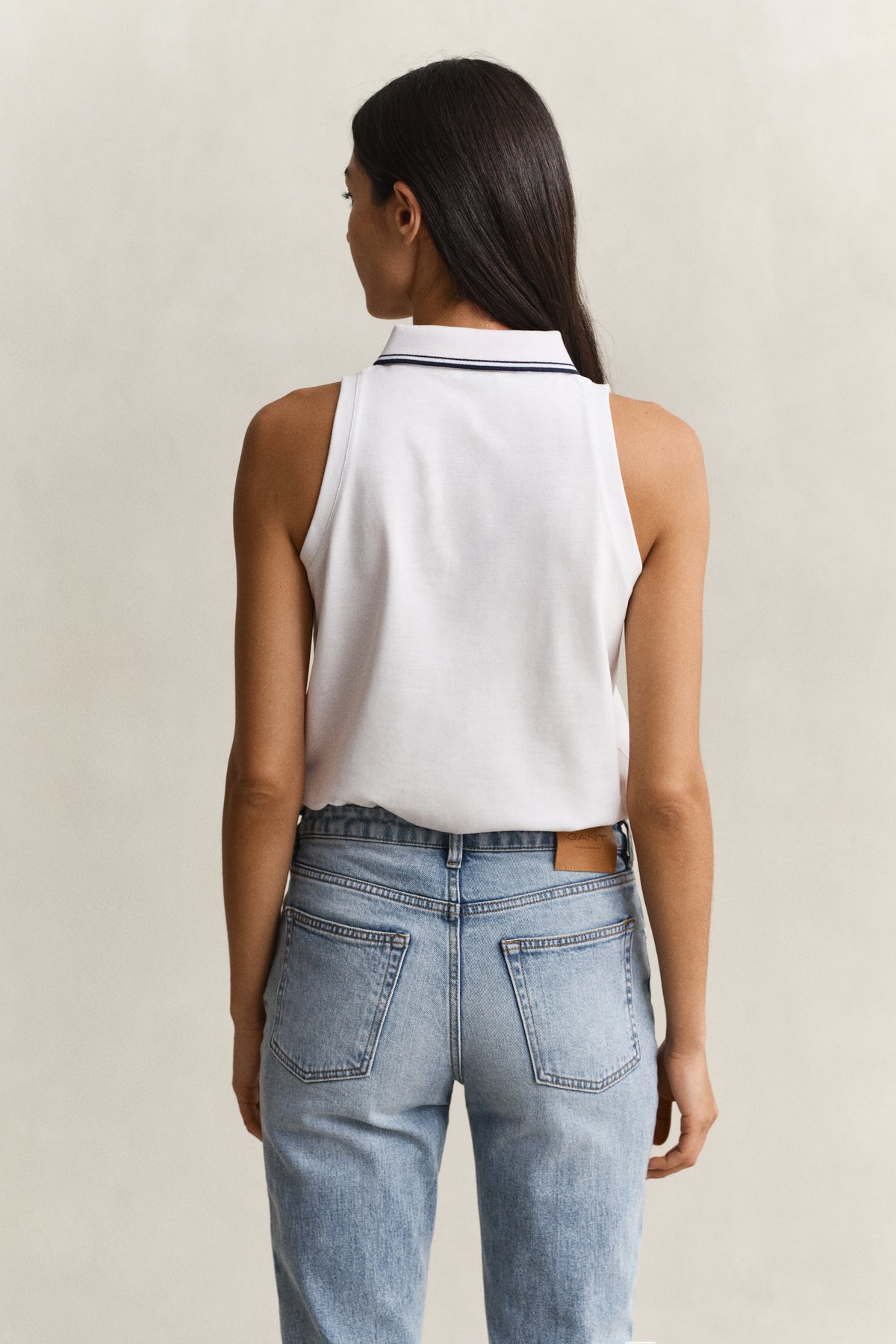 WHITE, REG SLEEVELESS PIQUE POLO, BACK-VIEW BY GANT AU.
