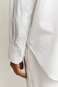 MODEL WEARING REL CLASSIC POPLIN SHIRT