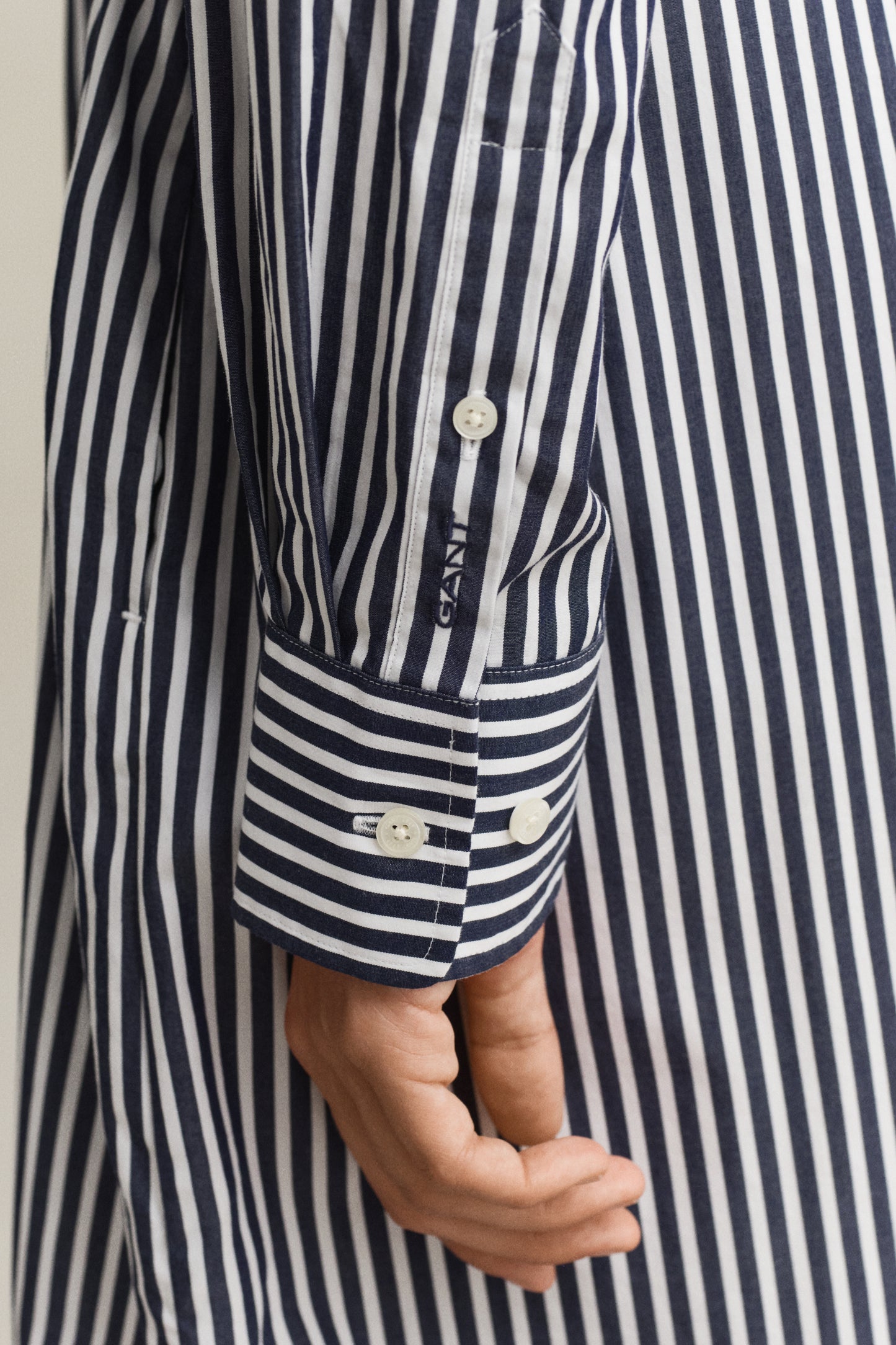 MODEL WEARING CLASSIC POPLIN STRIPE SHIRT DRESS