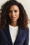 MODEL WEARING SLIM PIQUE BLAZER