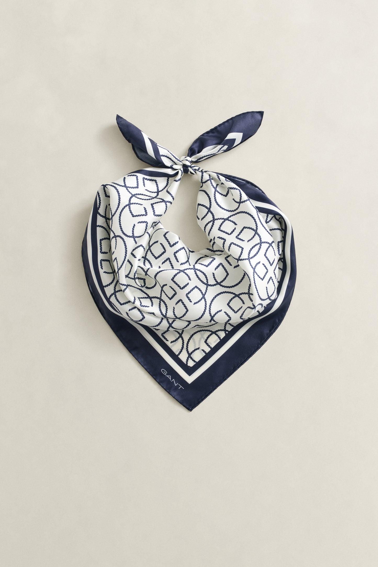CREAM, MONOGRAM PRINT SILK SCARF, FLAT-LAY BY GANT AU.