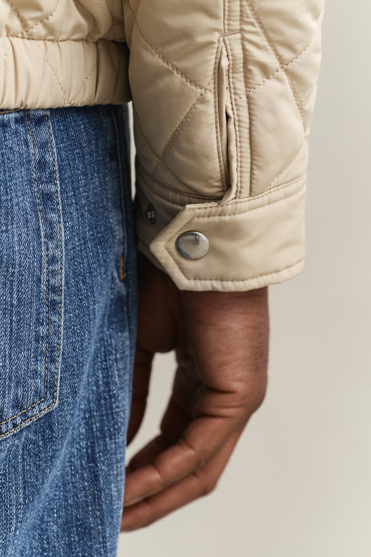 MODEL WEARING QUILTED WINDCHEATER