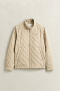 OAT BEIGE, QUILTED WINDCHEATER, FLAT-LAY BY GANT AU.