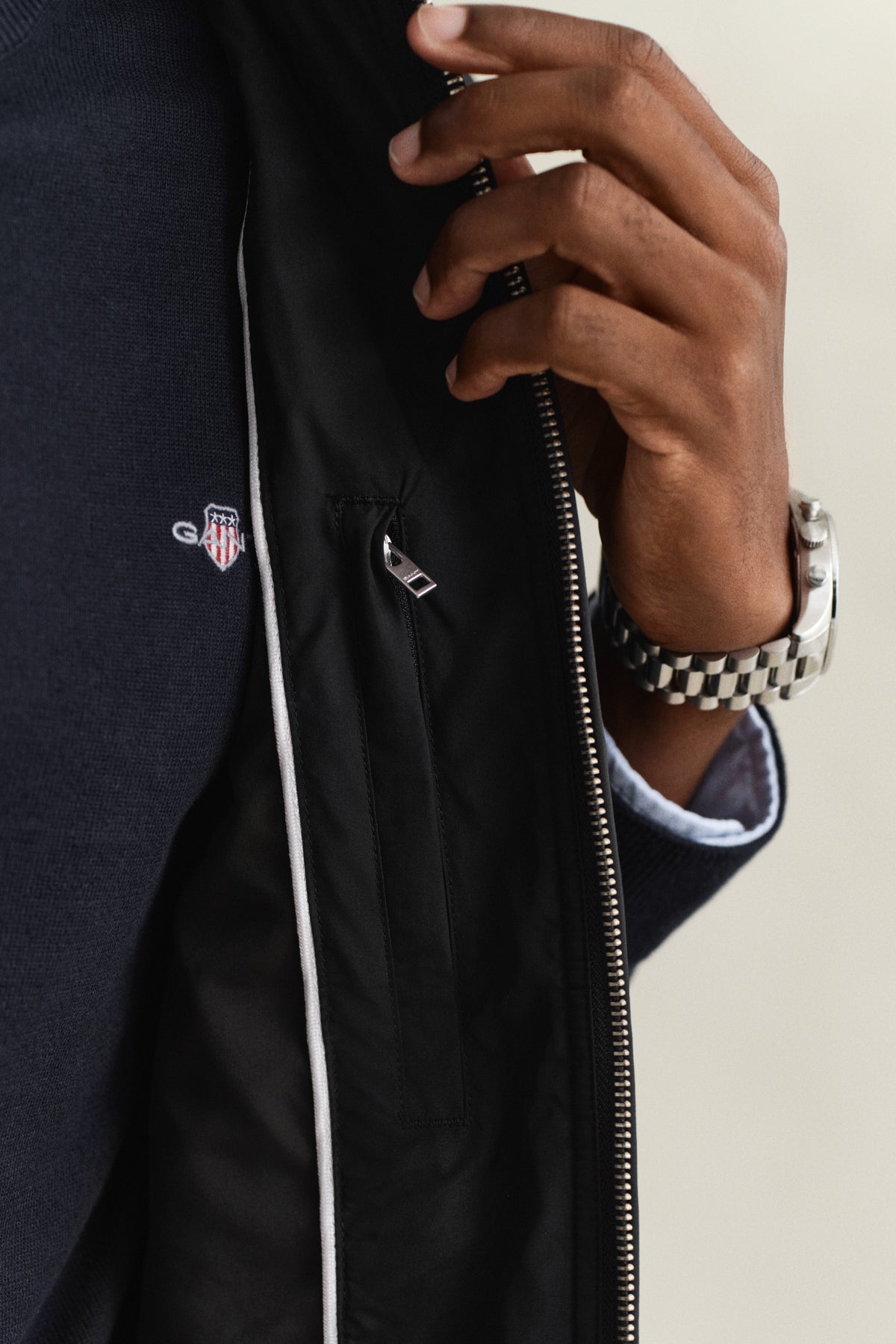 MODEL WEARING QUILTED WINDCHEATER VEST