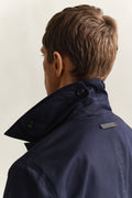 MODEL WEARING COTTON BLEND CAR COAT