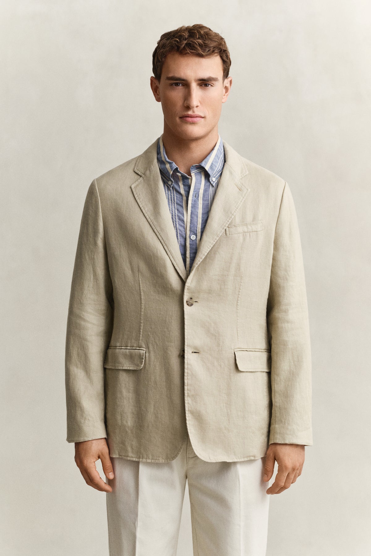 MODEL WEARING GMNT DYE LINEN BLAZER
