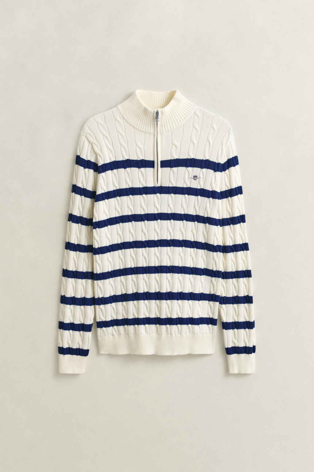 CREAM, STRIPED COTTON CABLE HALF ZIP, FLAT-LAY BY GANT AU.