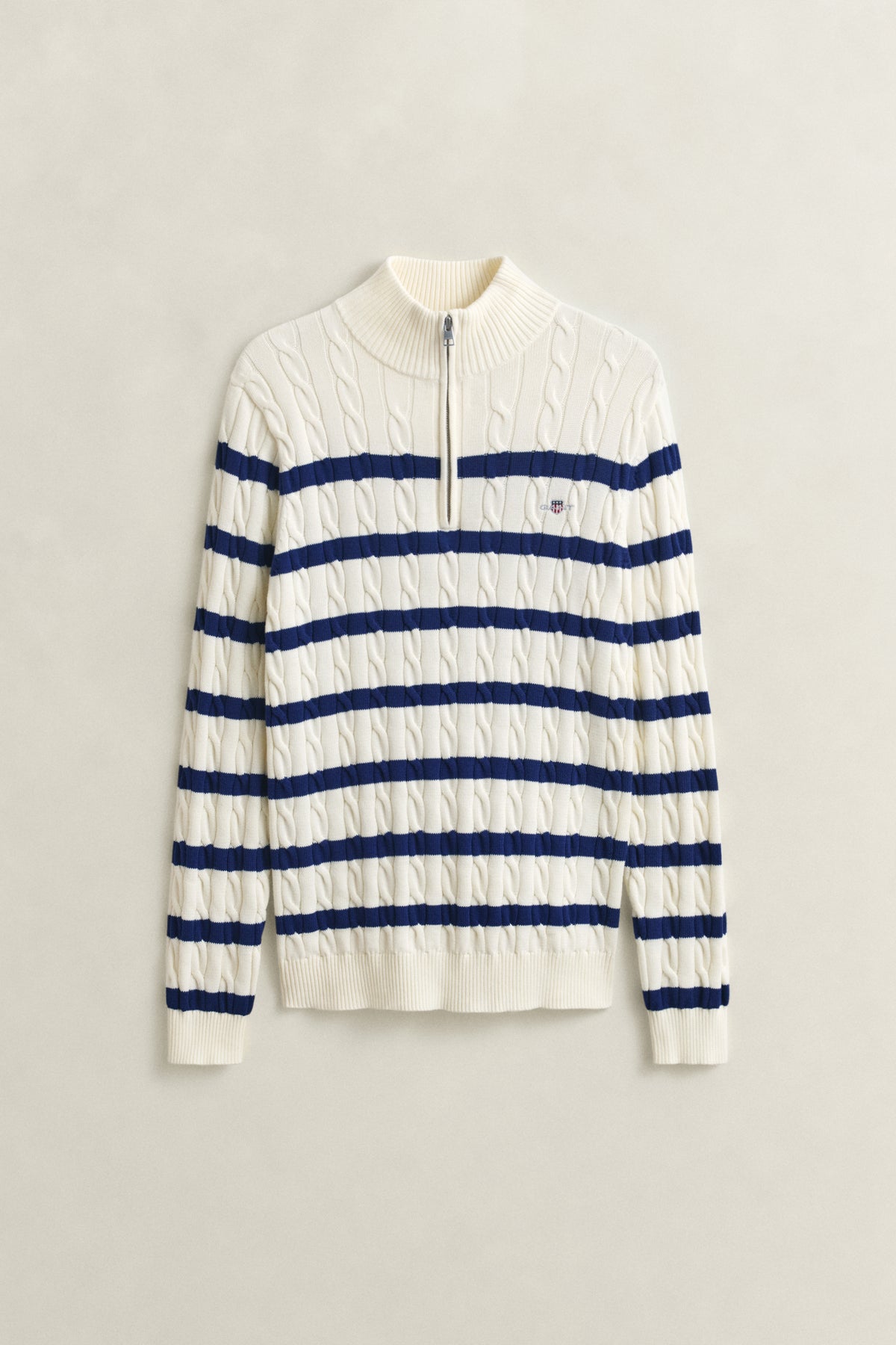 CREAM, STRIPED COTTON CABLE HALF ZIP, FLAT-LAY BY GANT AU.