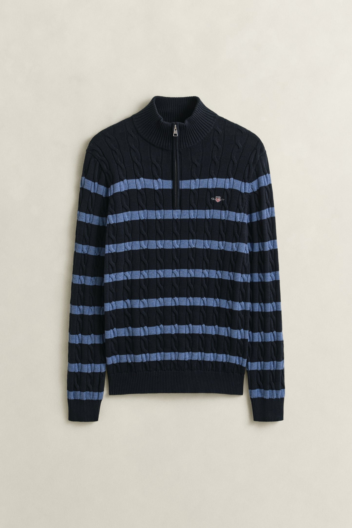 EVENING BLUE, STRIPED COTTON CABLE HALF ZIP, FLAT-LAY BY GANT AU.