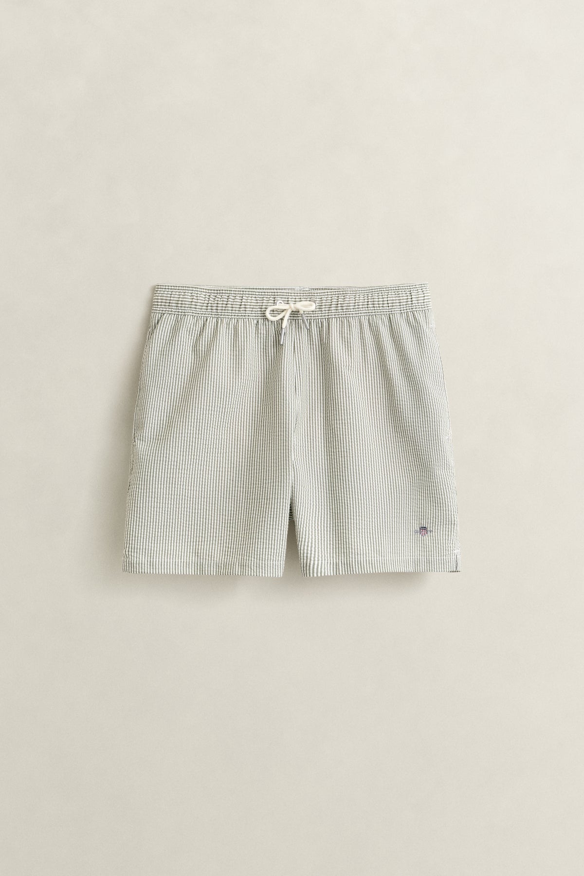 DRY HERB GREEN, STRIPED SEERSUCKER SWIM SHORTS, FRONT-VIEW BY GANT AU.