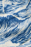 VINTAGE BLUE, WAVES PRINT SWIM SHORTS, FLAT-LAY BY GANT AU.