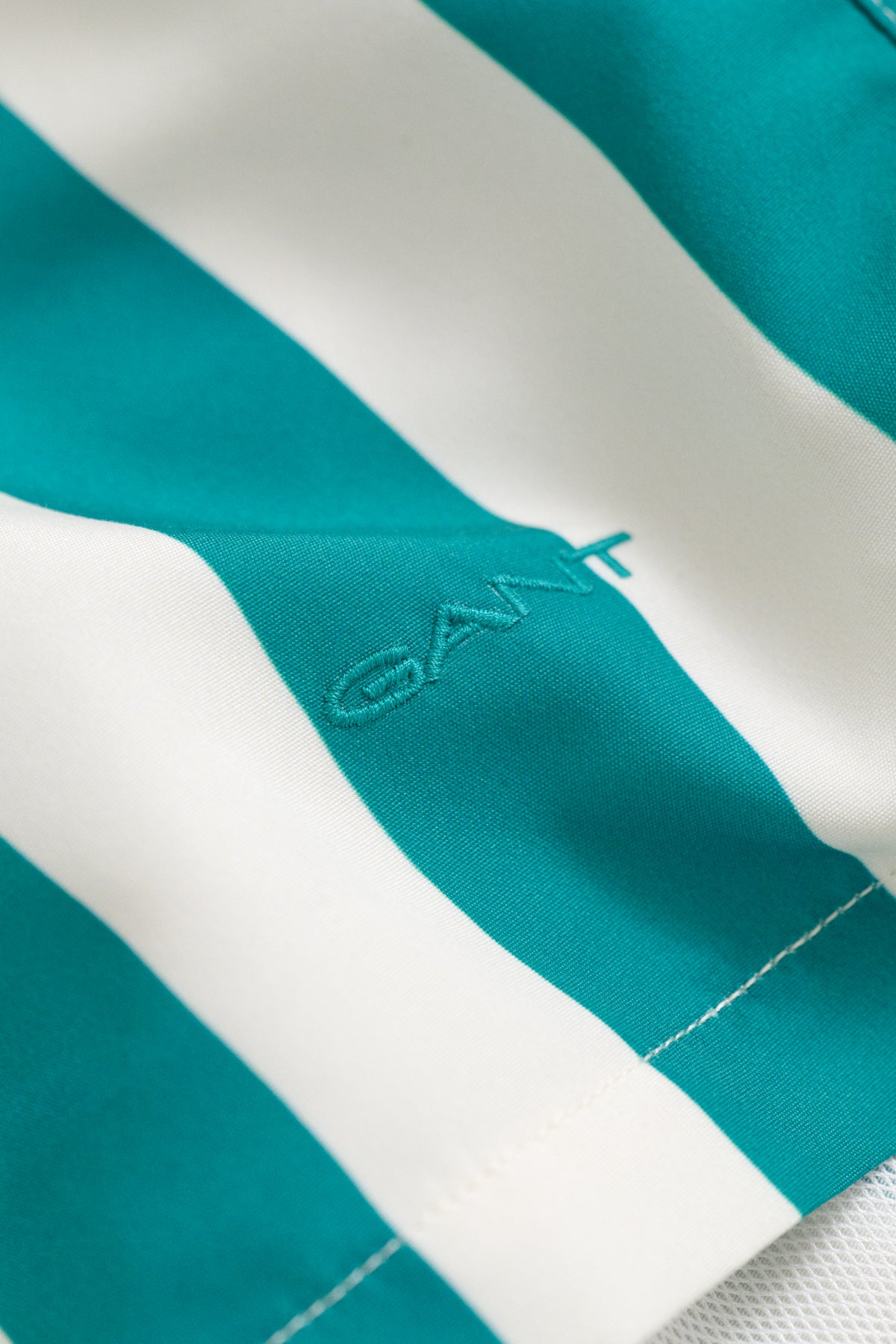AQUA BLUE, BLOCK STRIPED SWIM SHORTS, FLAT-LAY BY GANT AU.