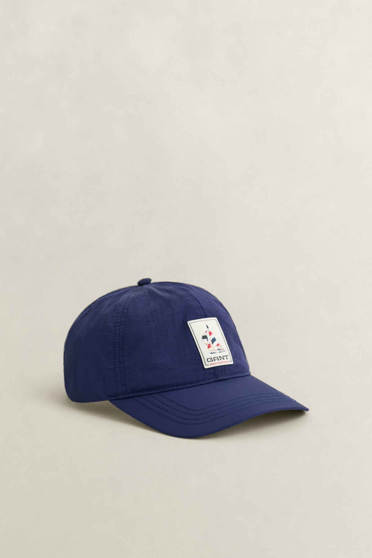 CLASSIC BLUE, GRAPHIC CRINKLED CAP, FRONT-VIEW BY GANT AU.