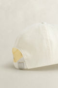 CREAM, LINEN CAP, FLAT-LAY BY GANT AU.