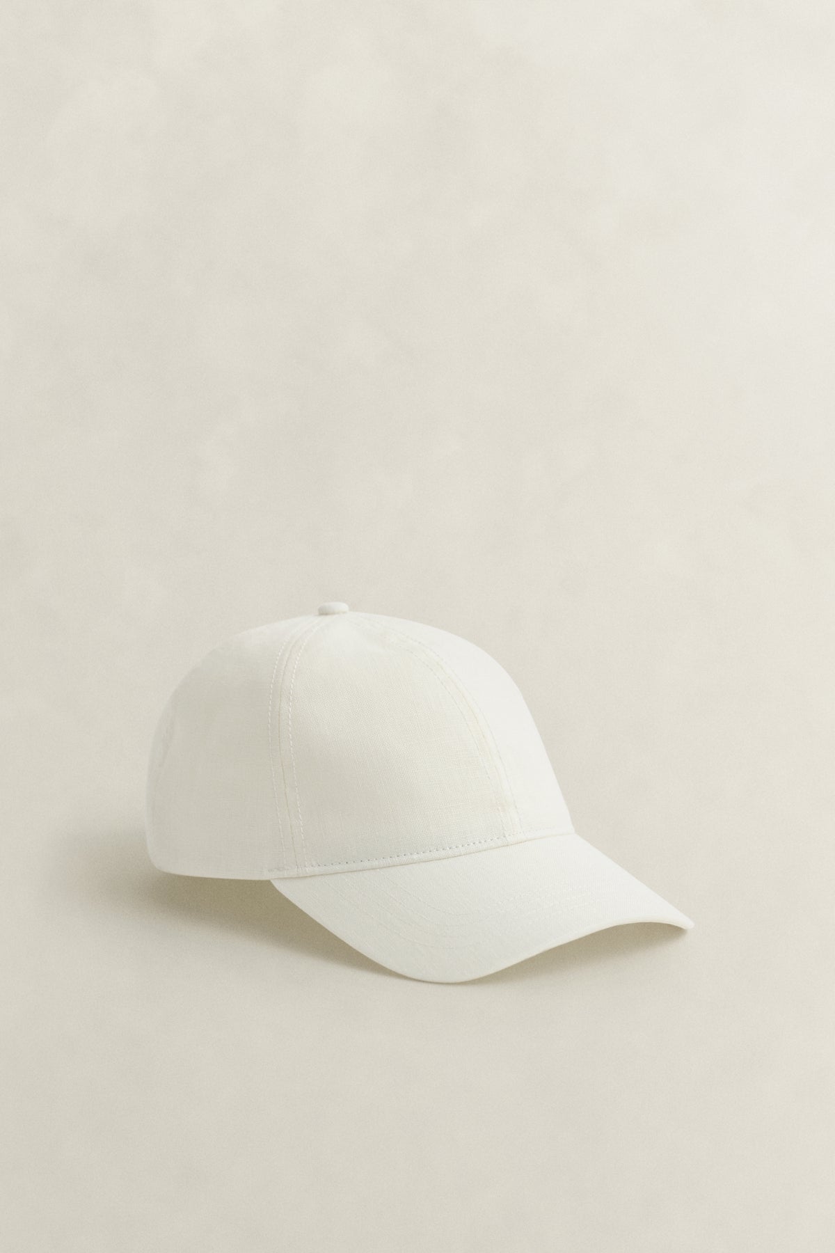 CREAM, LINEN CAP, FRONT-VIEW BY GANT AU.