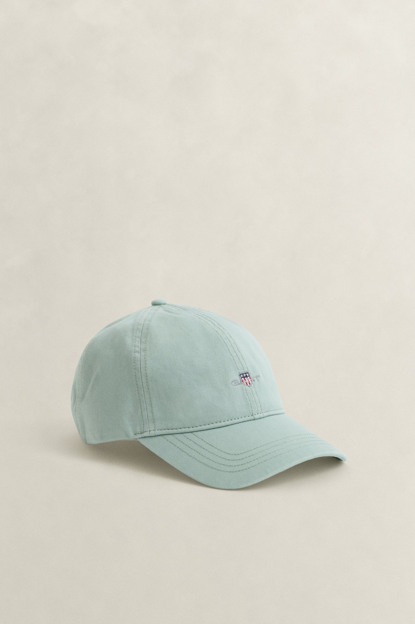 WASHED TURQUOISE, SHIELD SUNFADED CAP, FRONT-VIEW BY GANT AU.
