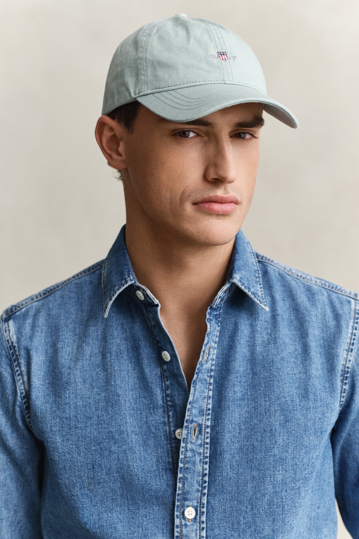 WASHED TURQUOISE, SHIELD SUNFADED CAP BY GANT AU.