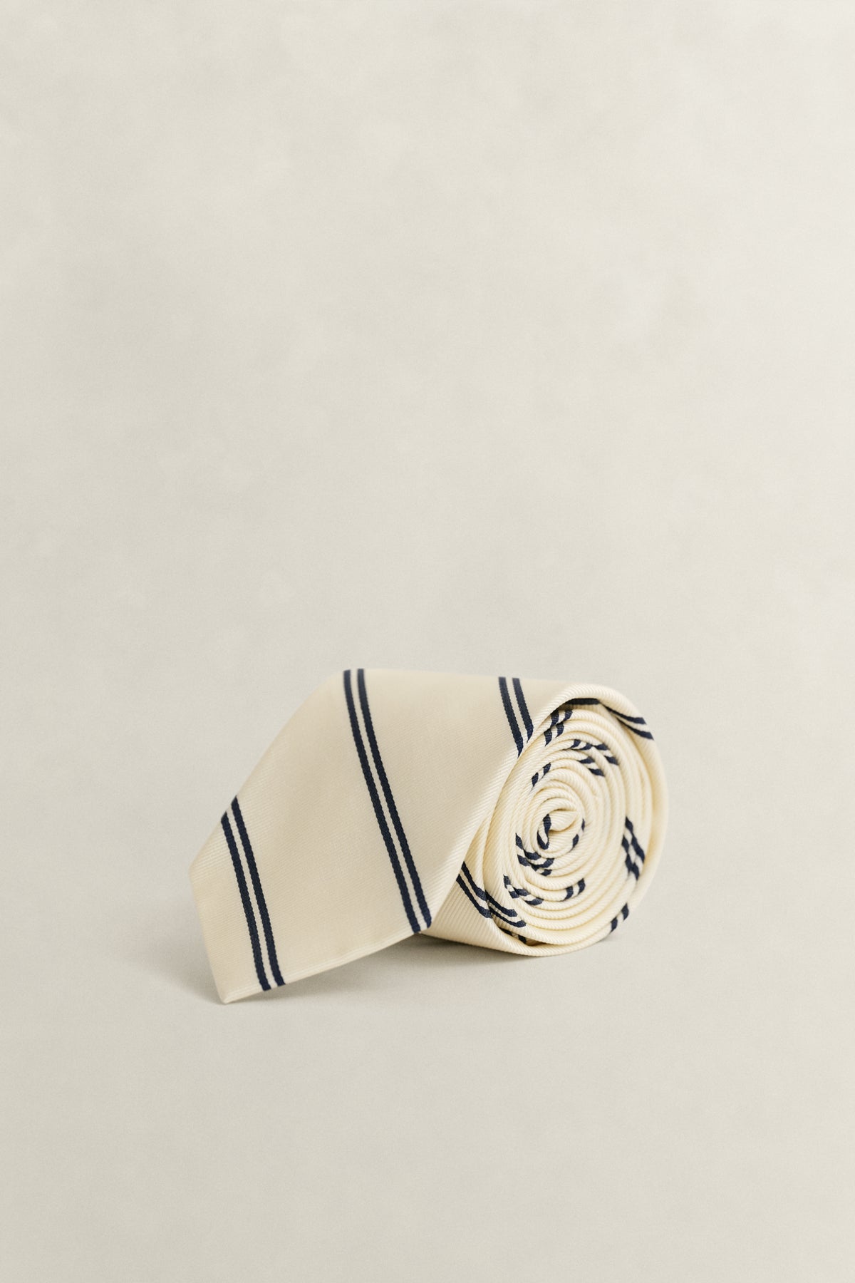 CREAM, STRIPED TIE BY GANT AU.