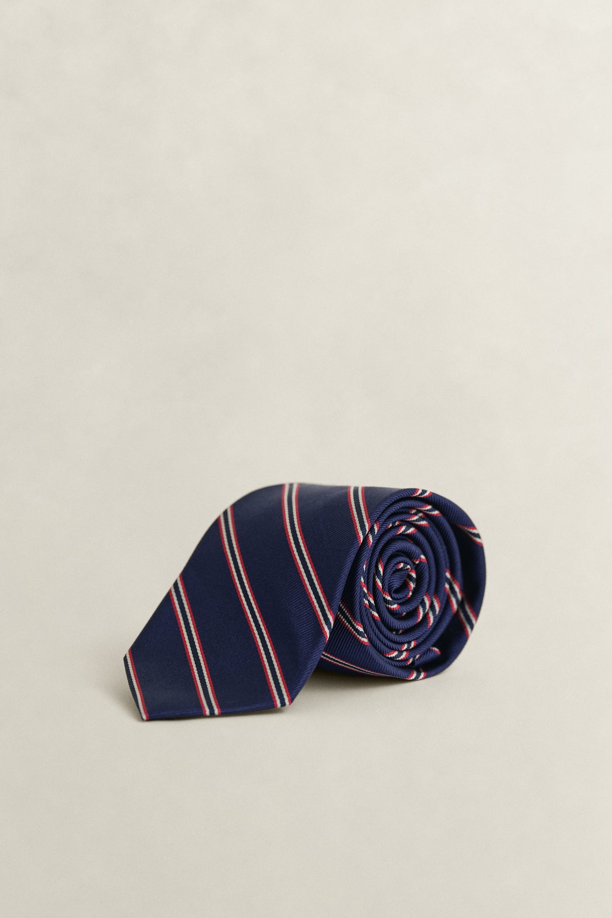 RICH NAVY, STRIPED TIE BY GANT AU.