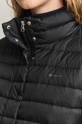 MODEL WEARING LIGHT DOWN COAT