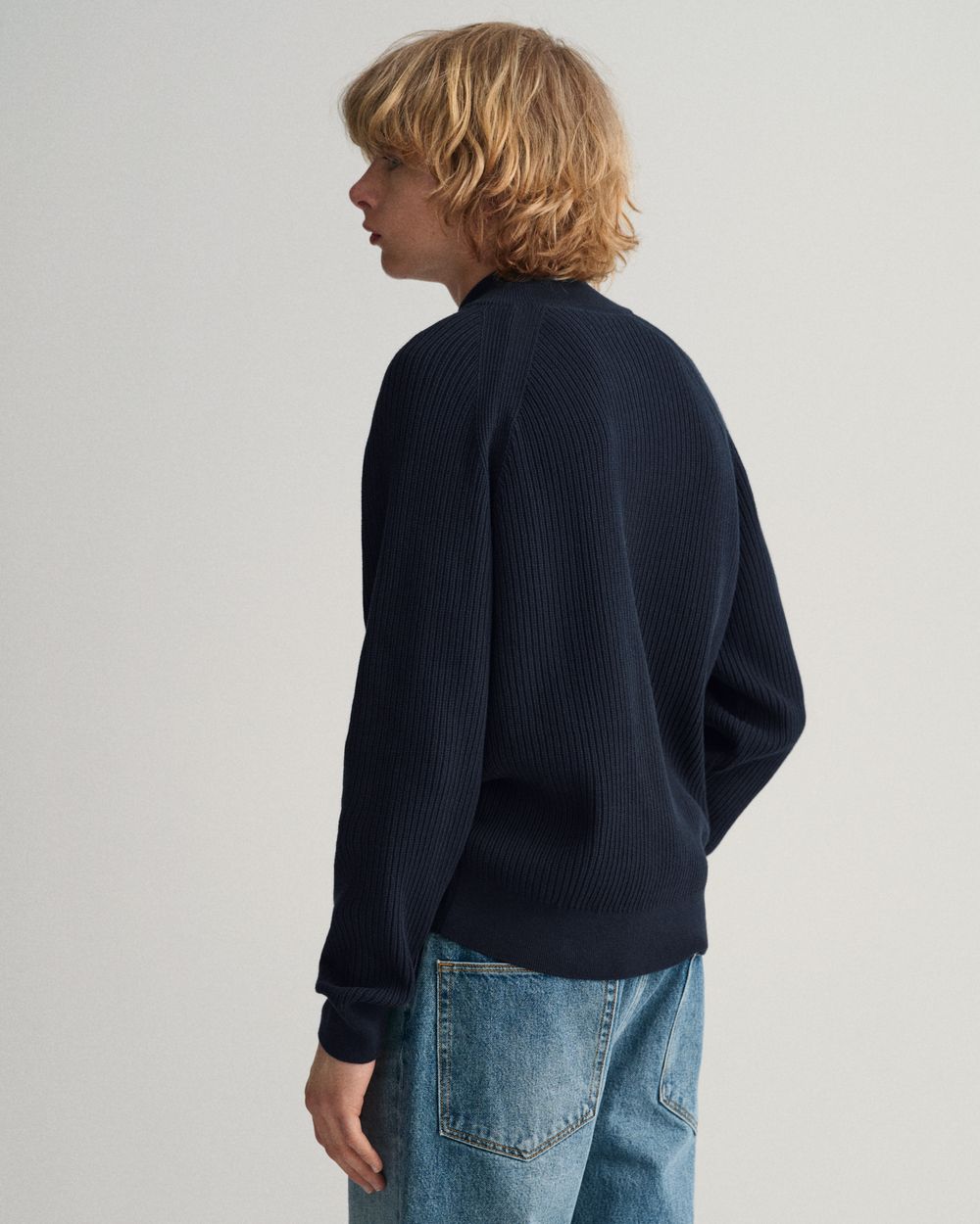 MODEL WEARING D1. CASUAL COTTON RIBBED HALF ZIP